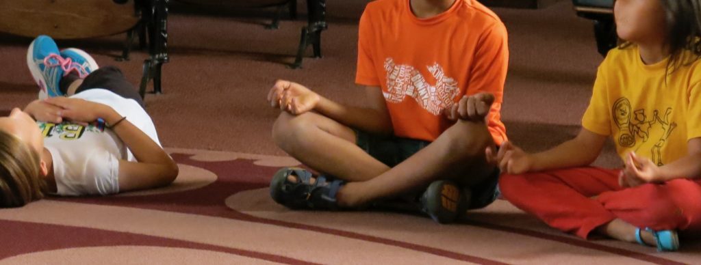 Children meditating.